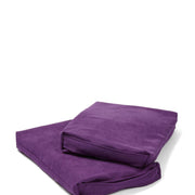 Mor renkli dikdörtgen minderler üst üste duruyor.