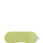 Açık yeşil, etiketli uyku maskesi - rahatlatıcı ve dinlendirici.